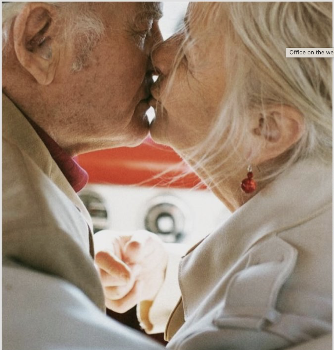 Elderly couple sharing a tender moment